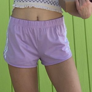 Light purple/pink adidas shorts from urban